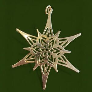 Metropolitan Museum of Art star ornament, 1976, 24k gold plated brass
